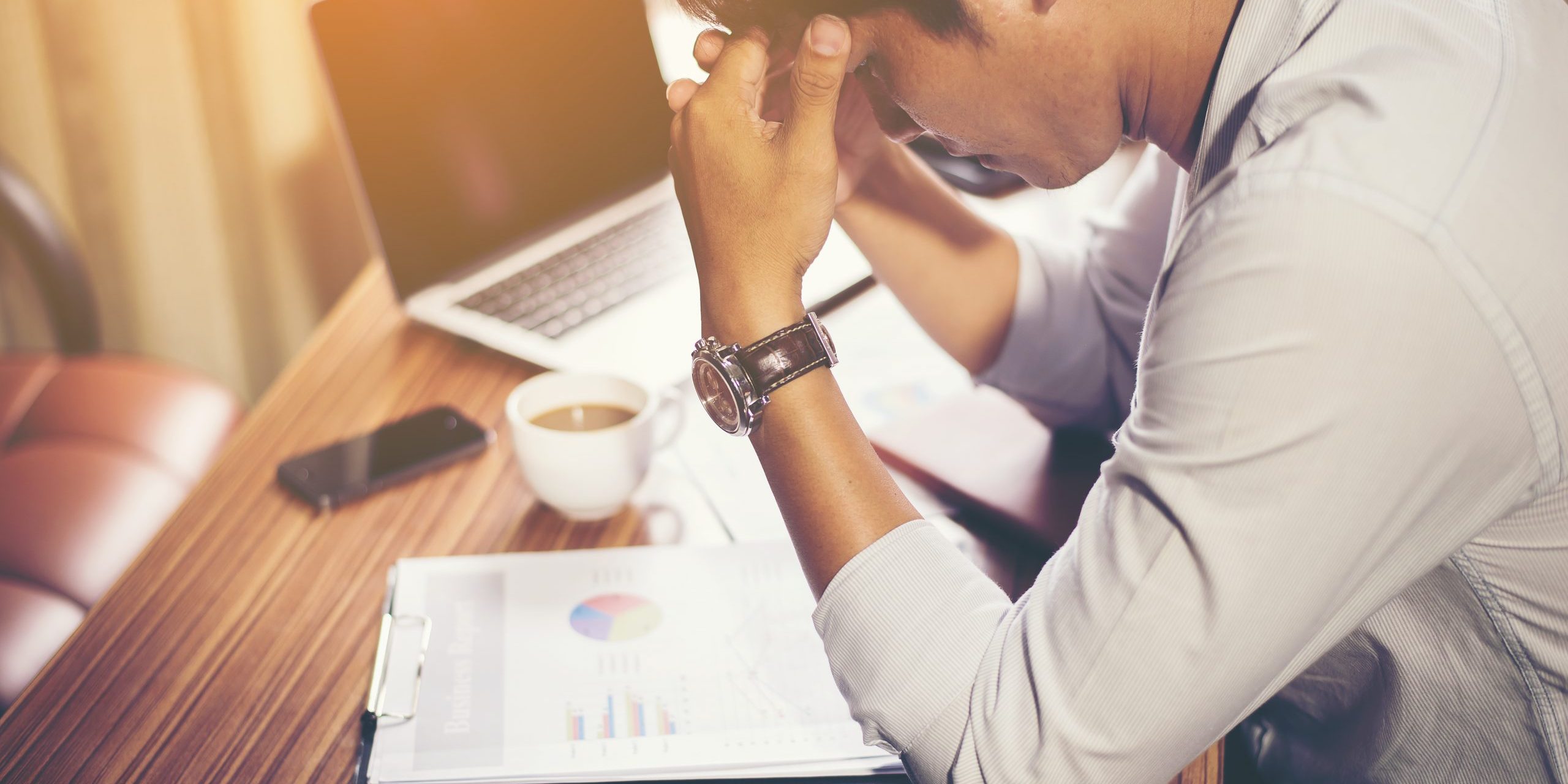 Serious businessman working with analysis financial at office.
